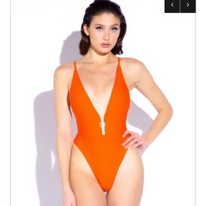 Never worn, super cute Zip one piece swimsuit